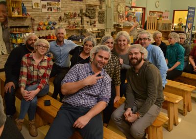 Crawford Roofing Employees volunteering with Feed My Starving Children Through Rabine Group Foundation